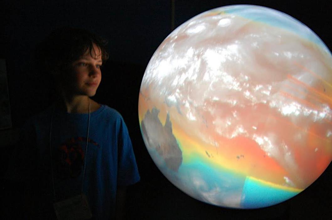 Child with 3-D Globe