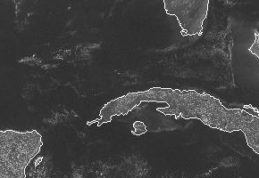 Opposing seabreezes meeting over Cuba forming a line of cumulus clouds