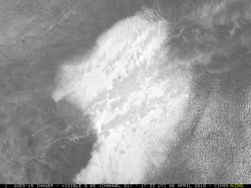 Stratocumulus deck over the Rio Grande Valley region, with cirrus drifting overhead