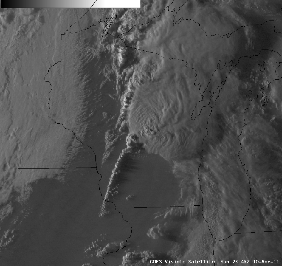 GOES-13 0.63 Âµm visible image + cloud-to-ground lightning strikes + storm reports