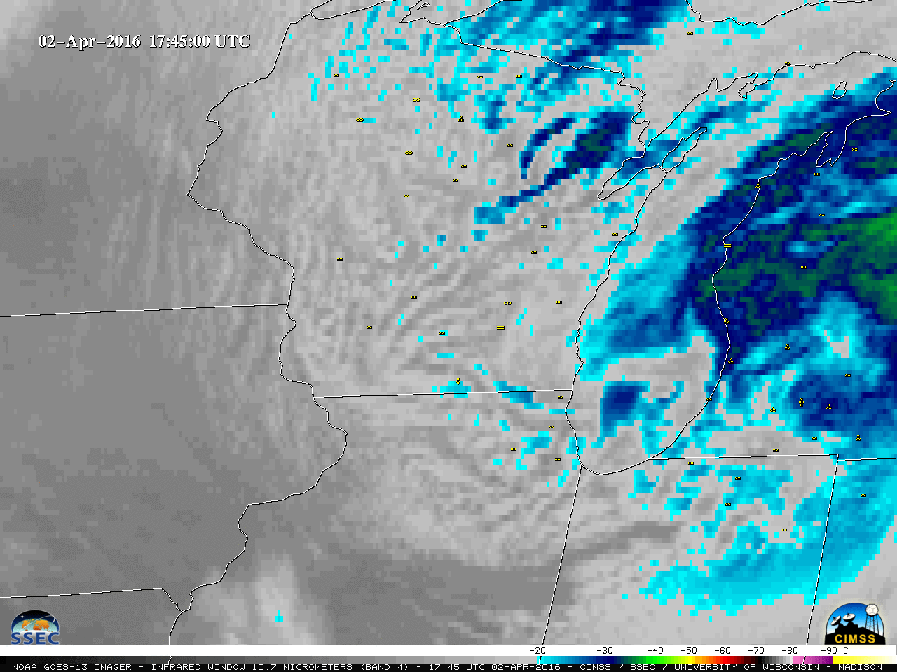GOES-13 Infrared Window (10.7 µm) images, with hourly surface weather symbols [click to play animation]