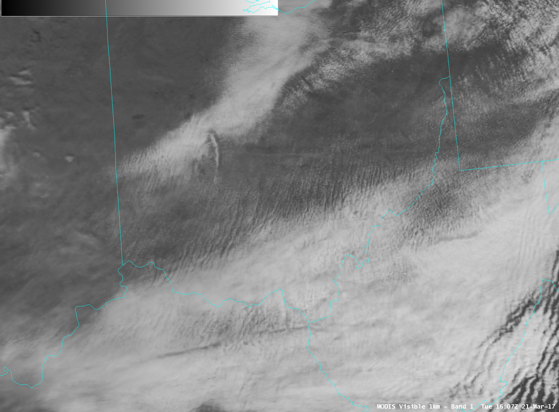 Terra MODIS Visible (0.65 µm) and Cirrus (1.375 µm) images [click to enlarge]