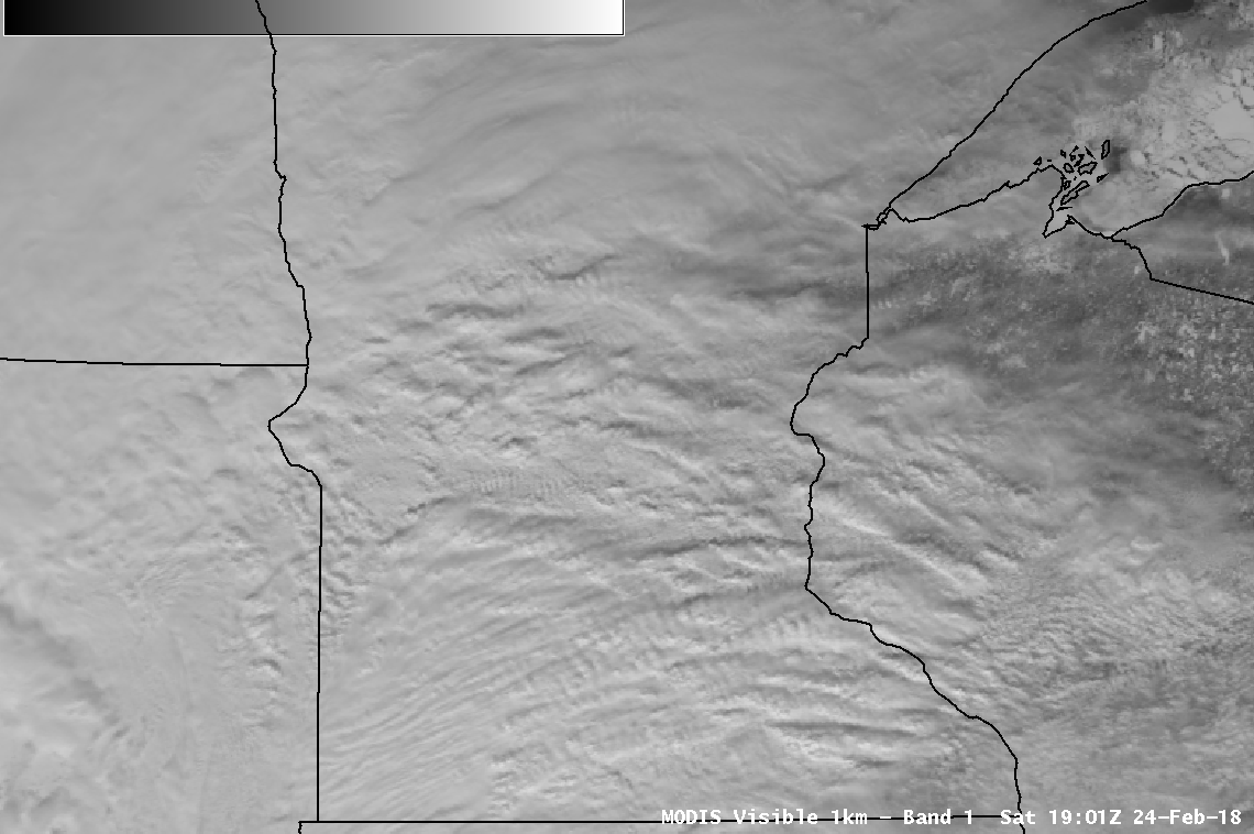 Aqua MODIS Visible (0.65 µm) and Infrared Window (11.0 µm) images [click to enlarge]