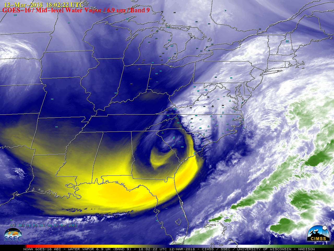 GOES-16 Mid-level (6.9 µm) Water Vapor images, with plots of hourly surface weather symbols [click to play MP4 animation]